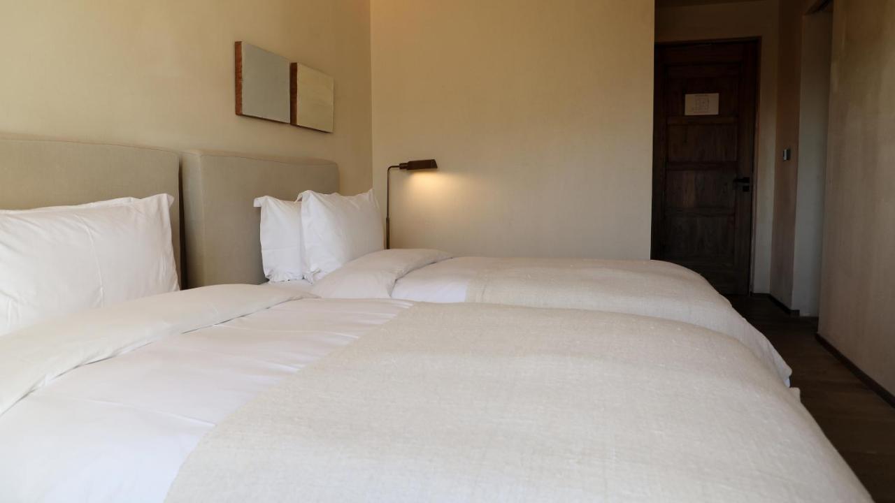 Sunyata Hotel. Deqin Meili Deqen Екстериор снимка